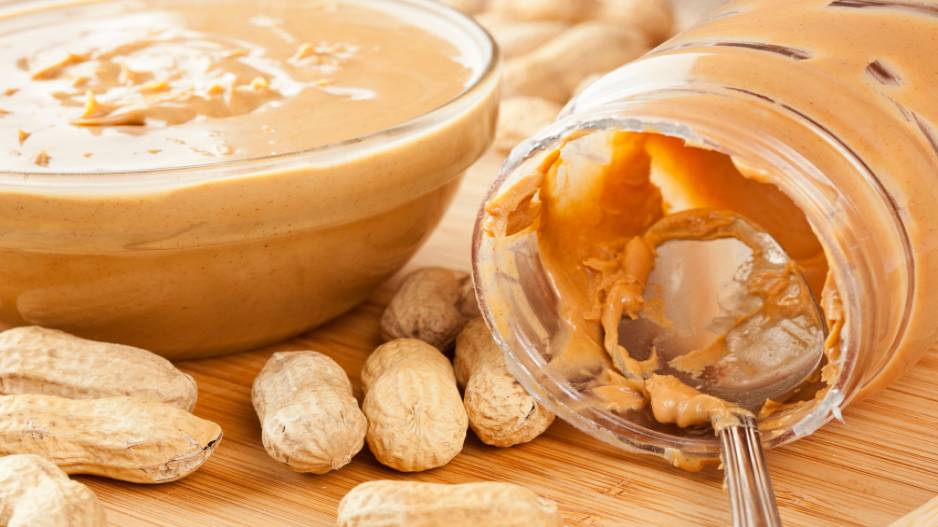 Peanut butter a high protein spread made from grounded peanuts is a