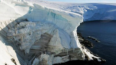 Melting ice shows through at a cliff face at Landsend, on the coast of Cape Denison in Antarctica