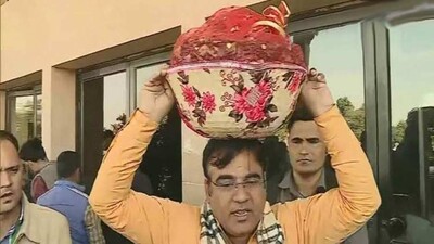 BJP-MLA-with-basket-of-locu