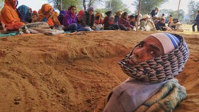 Farmers-Buried-neck-deep-in