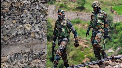 Indian Army jawans patrol near Line of Control (LoC) in Poonch