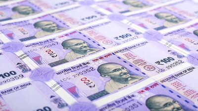 Rupee hits new low, falls 14 paise to 77.69 per US dollar
