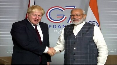 Prime Minister Narendra Modi meets UK Prime Minister Boris Johnson at the G7 Summit