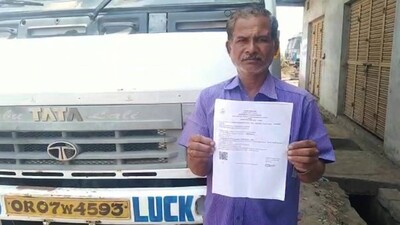 Odisha: Man Driving Truck In Berhampur Fined Rs 1000 For Not Wearing Helmet