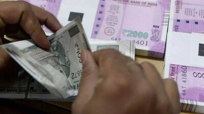 'COVID-19 Can Survive Longer On Bank Notes': Why You Shouldn't Get Paranoid
