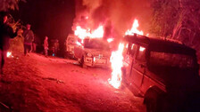 Angry villagers burn vehicles belonging to security personnel