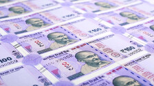 Rupee touches fresh record low against US dollar, closes at 78.04