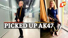 Ukraine MP Picks Up Weapon 