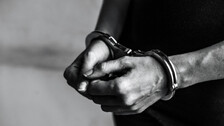 Director of Real Estate Company Arrested