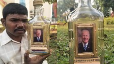 Artist from Odisha, L Eswar Rao crafts miniature photo frame of Joe Biden using small pieces of stones inside a glass bottle to congratulate him ahead of his swearing-in