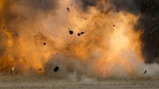 A dummy acting as a motorcycle suicide bomber is blown up next to a vehicle during a course on blast scene investigation near Hua Hin