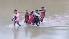 Pregnant Woman In Odisha Forced To Cross River In Sling Sans Road Connectivity