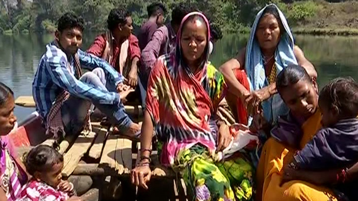 Voters Crossing River On Boat To Cast Their Votes In Malkangiri